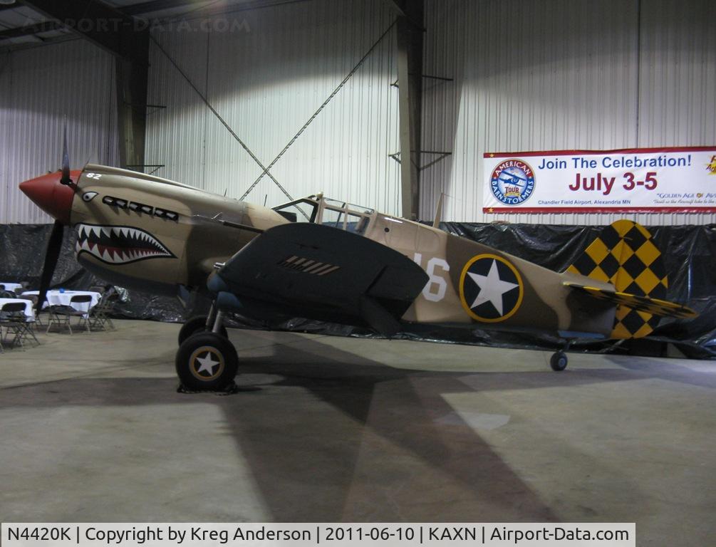 N4420K, Curtiss P-40E Warhawk C/N AK75315134, Curtiss Wright P-40E Warhawk set up for the following night's hangar dance.