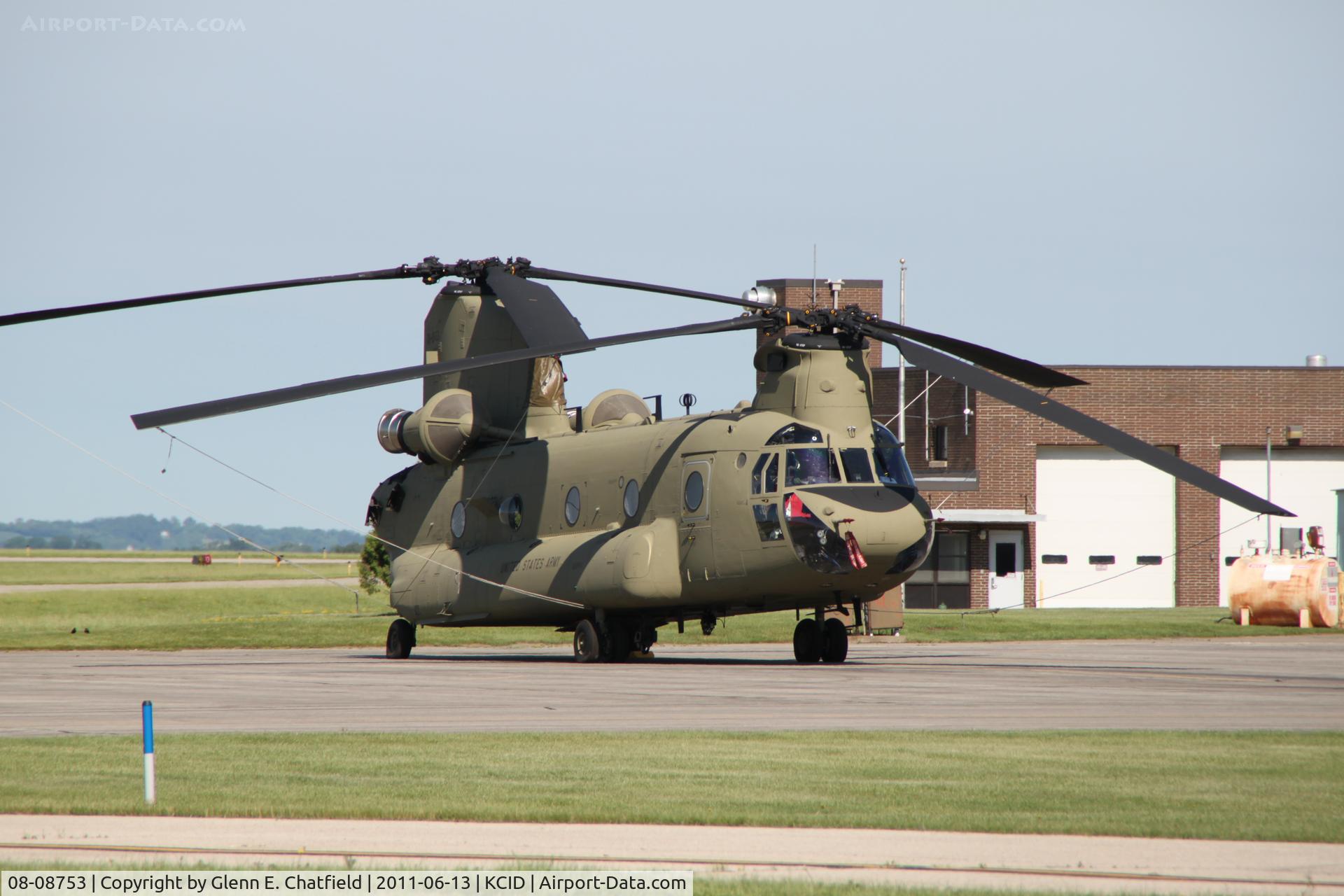 08-08753, 2011 Boeing CH-47F Chinook C/N M8753, On the Rockwell-Collins ramp.  Photographed through chain-link fence
