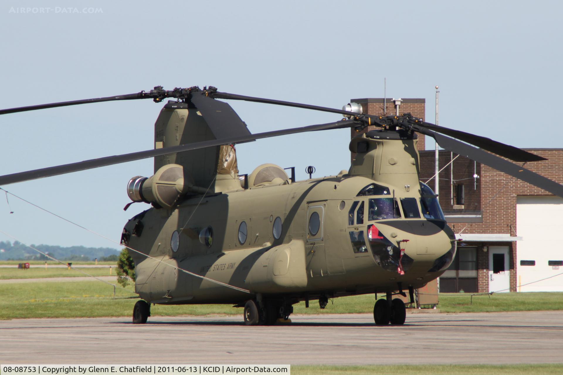 08-08753, 2011 Boeing CH-47F Chinook C/N M8753, On the Rockwell-Collins ramp.  Photographed through chain-link fence