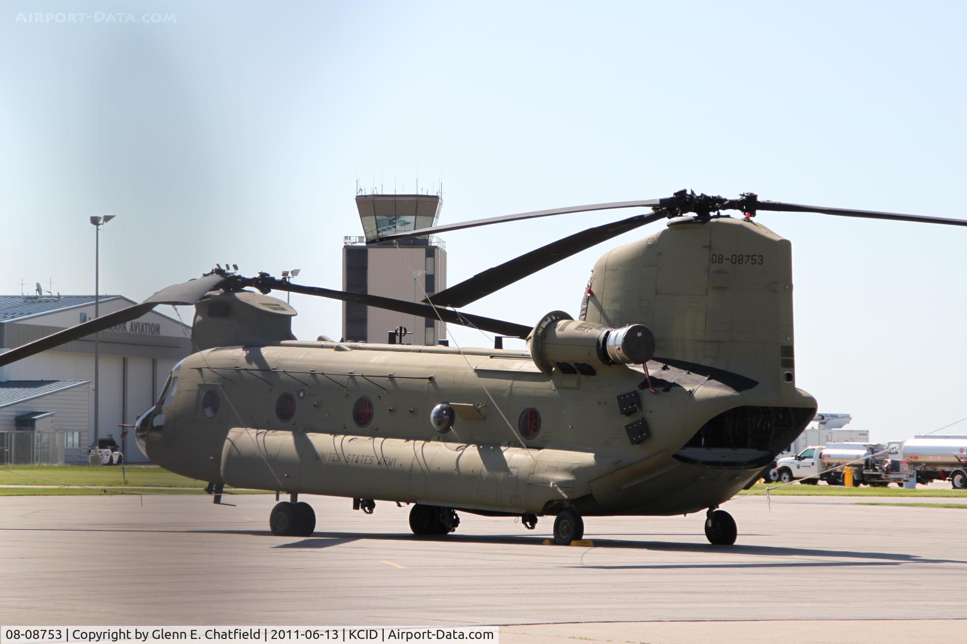 08-08753, 2011 Boeing CH-47F Chinook C/N M8753, On the Rockwell-Collins ramp.  Photographed through chain-link fence