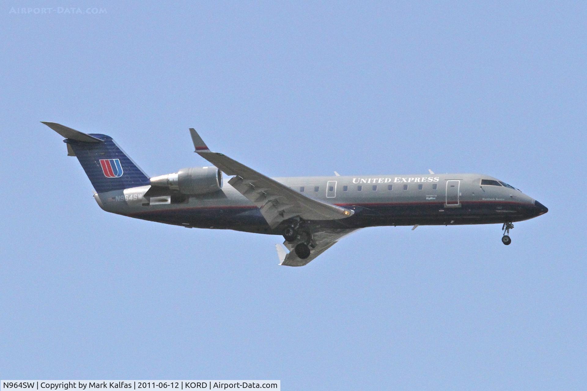 N964SW, 2003 Bombardier CRJ-200ER (CL-600-2B19) C/N 7868, SkyWest/United Express Bombardier CL-600-2B19, SKW5544 arriving from KFAR, RWY 10 approach KORD.