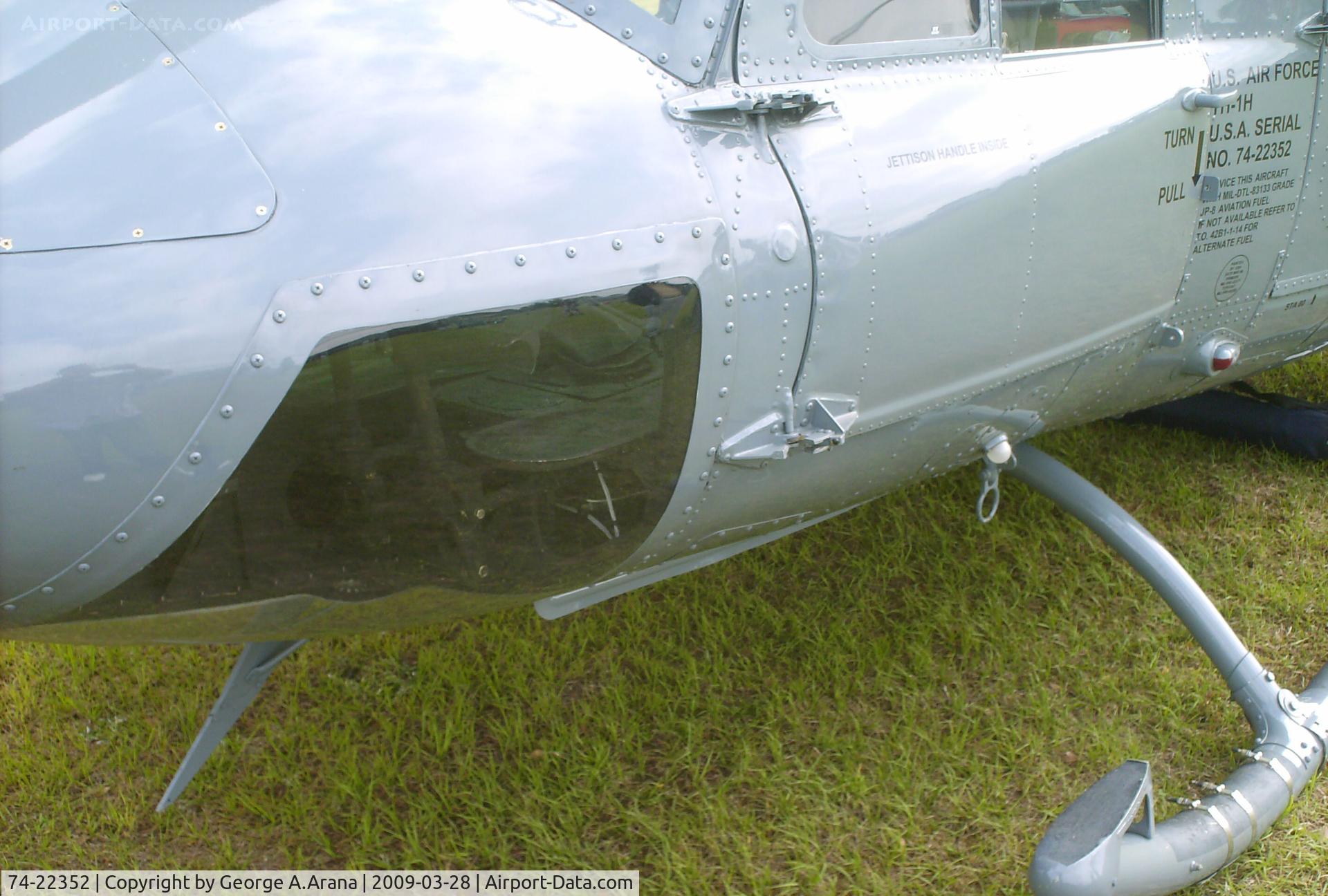 74-22352, 1974 Bell UH-1H Iroquois C/N 13676, Port windshield bubble and co-pilot door detail