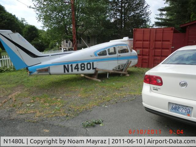 N1480L, Beech A23 C/N M878, N1480L, June 10 2011, is located in Millers Falls, MA, outside Greenfield, MA, on Route 2.