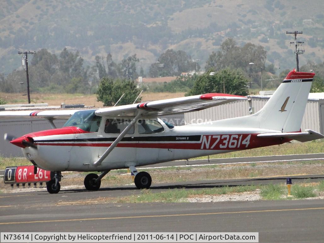 N73614, 1976 Cessna 172M C/N 17267578, Stopped awaiting instructions from ground control after landing on runway 26L