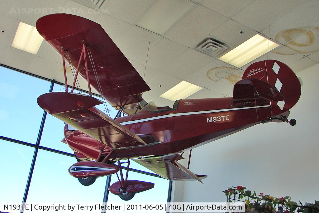 N193TE, Oldfield BABY LAKES C/N 001 (N193TE), Emery Thomas D SORTA BABY LAKES, c/n: 001 hanging from the roof of the reception area to Planes of Fame at Valle AZ