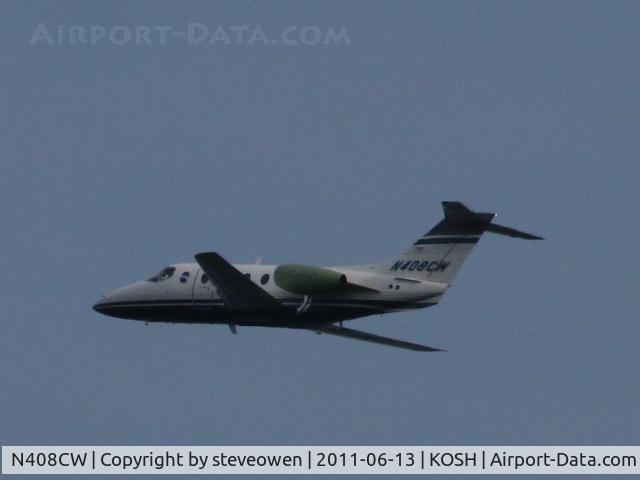 N408CW, 1996 Beech 400A Beechjet C/N RK-108, Taken from my back yard on climb out from KOSH runway 09