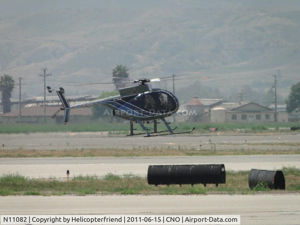 N11082, 1980 Hughes 500D (369D) C/N 1100845D, Flairing out from an autorotation