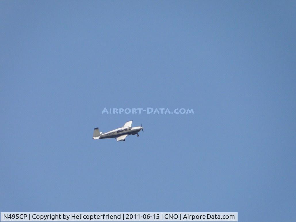 N495CP, 1995 Mooney M20R Ovation C/N 29-0058, Turning eastbound for downwind leg