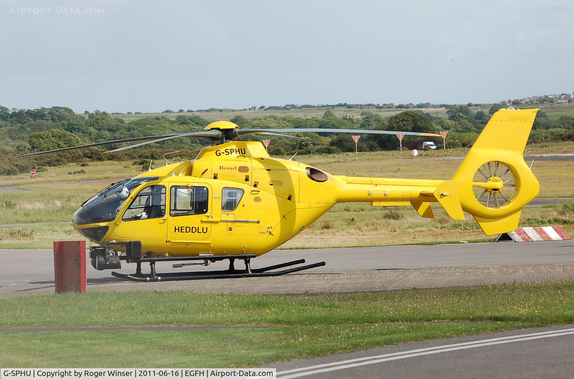G-SPHU, 2002 Eurocopter EC-135T-2 C/N 0245, Standing in for South and East Wales Police Air Support Unit helicopter (G-WONN) whilst it was away for servicing. Marked POLICE on starboard side.