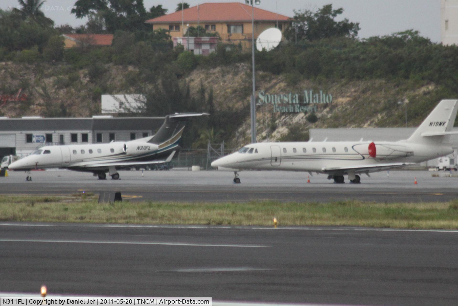 N311FL, 2010 Embraer EMB-505 Phenom 300 C/N 50500034, N311FL on the ramp at TNCM