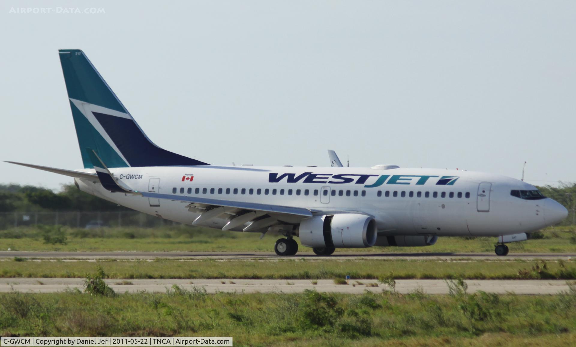 C-GWCM, 2003 Boeing 737-7CT C/N 32756, West jet landing at TNCA