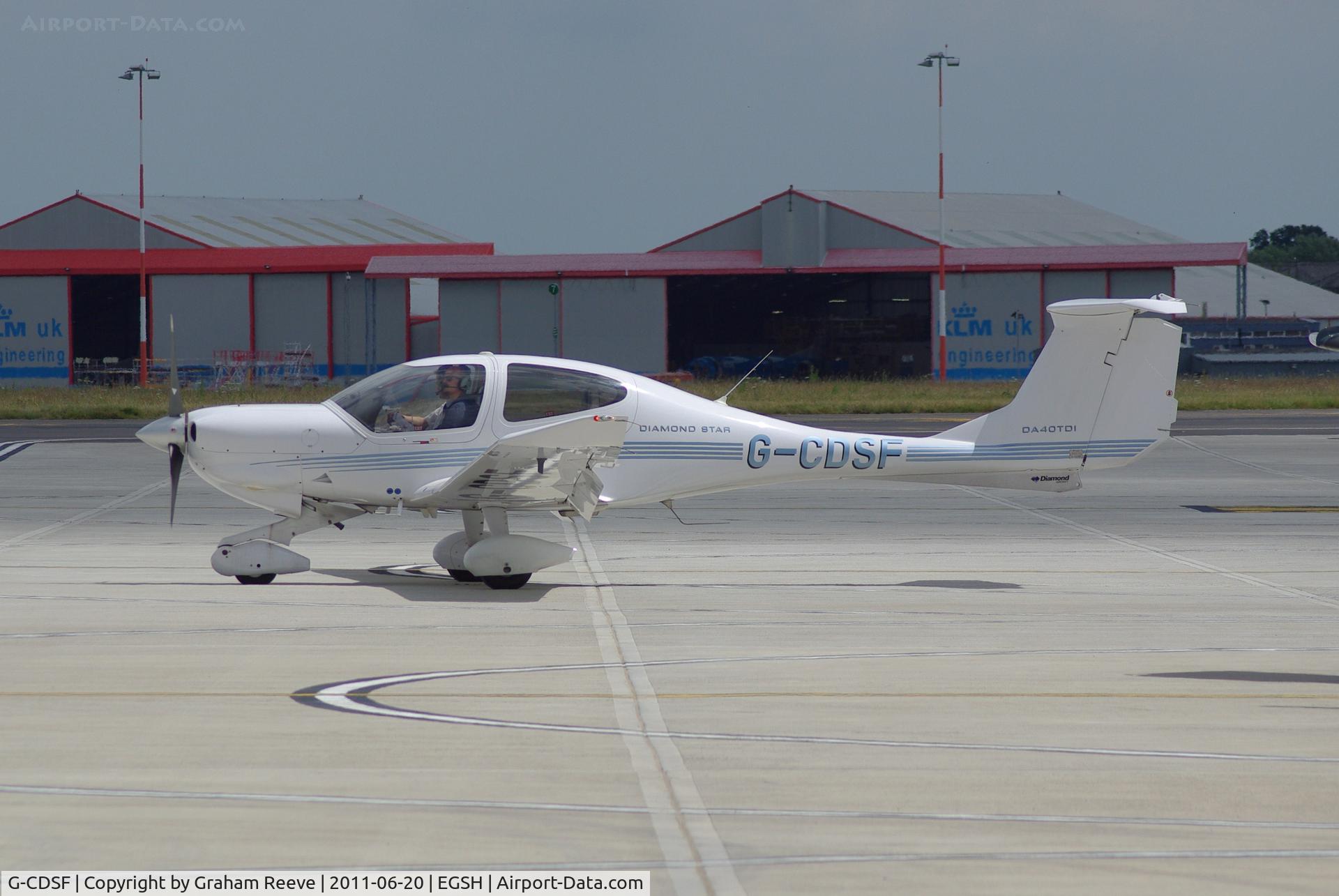 G-CDSF, 2005 Diamond DA-40D Diamond Star C/N D4.190, Out side the new Saxon hanger.