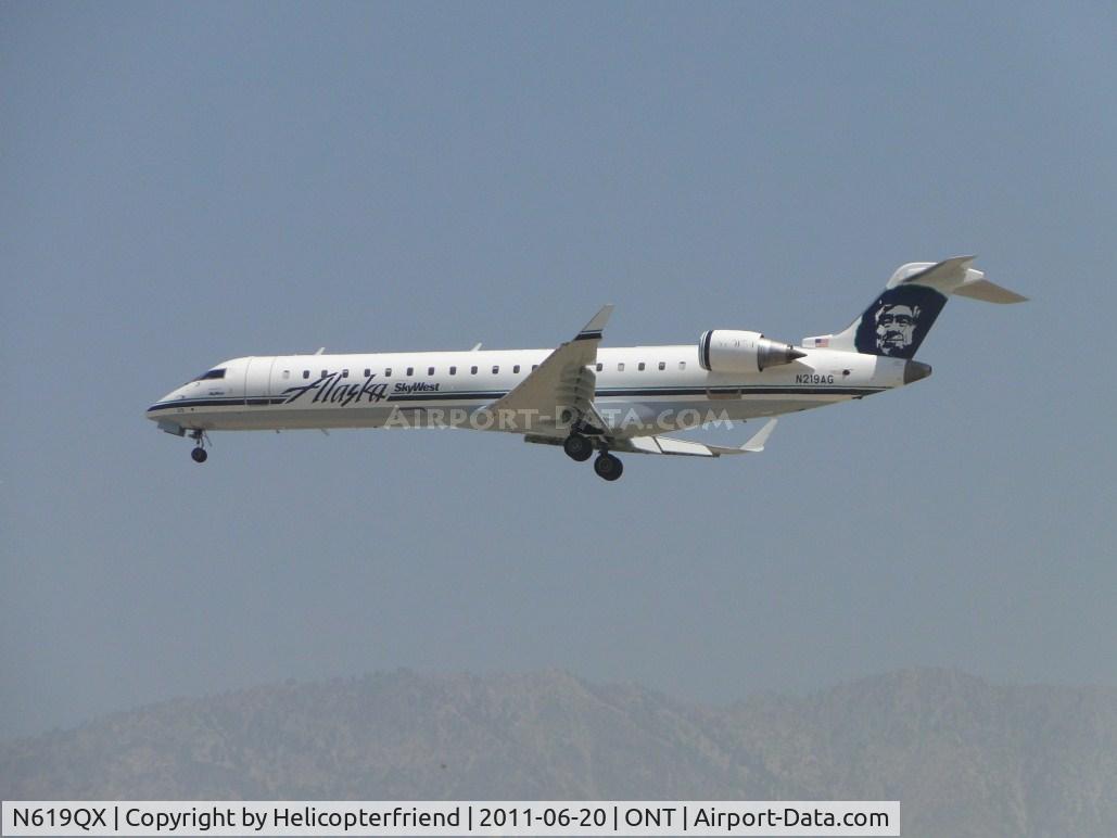 N619QX, 2006 Bombardier CRJ-701 (CL-600-2C10) Regional Jet C/N 10246, On final to runway 26. Pending Number Change to
619QX Date Change Authorized 04/14/2011 but still carrying N219AG, flown by Sky West