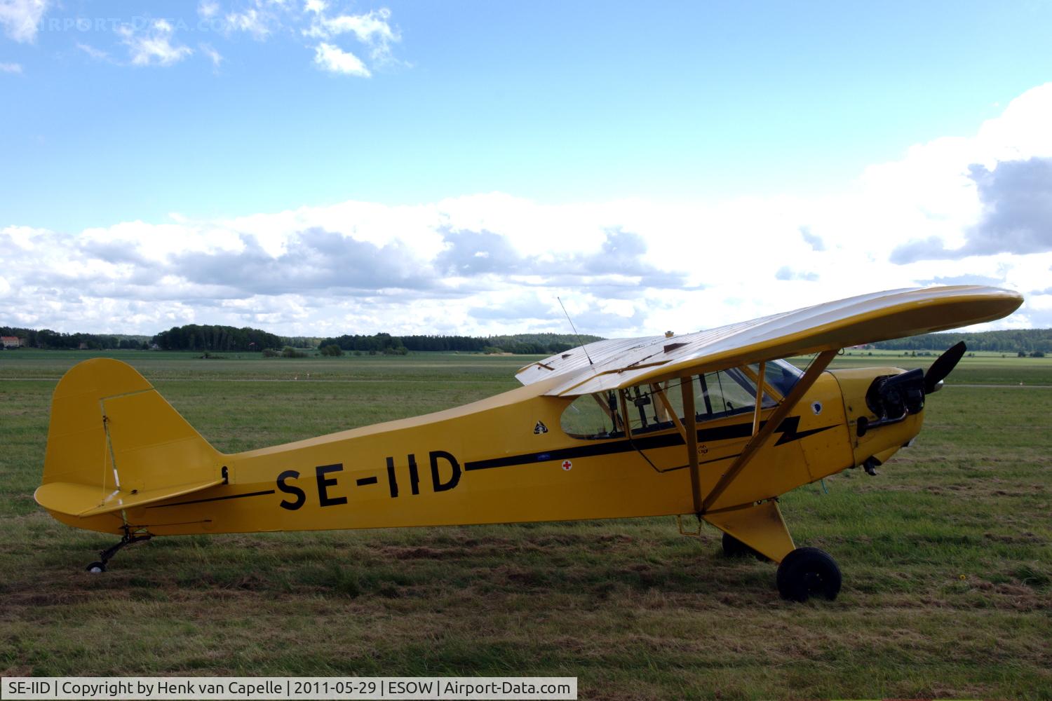 SE-IID, 1947 Piper J3C-65 Cub Cub C/N 23175, Piper Cub parked on the grass of Västerås Hässlö airport, Sweden.