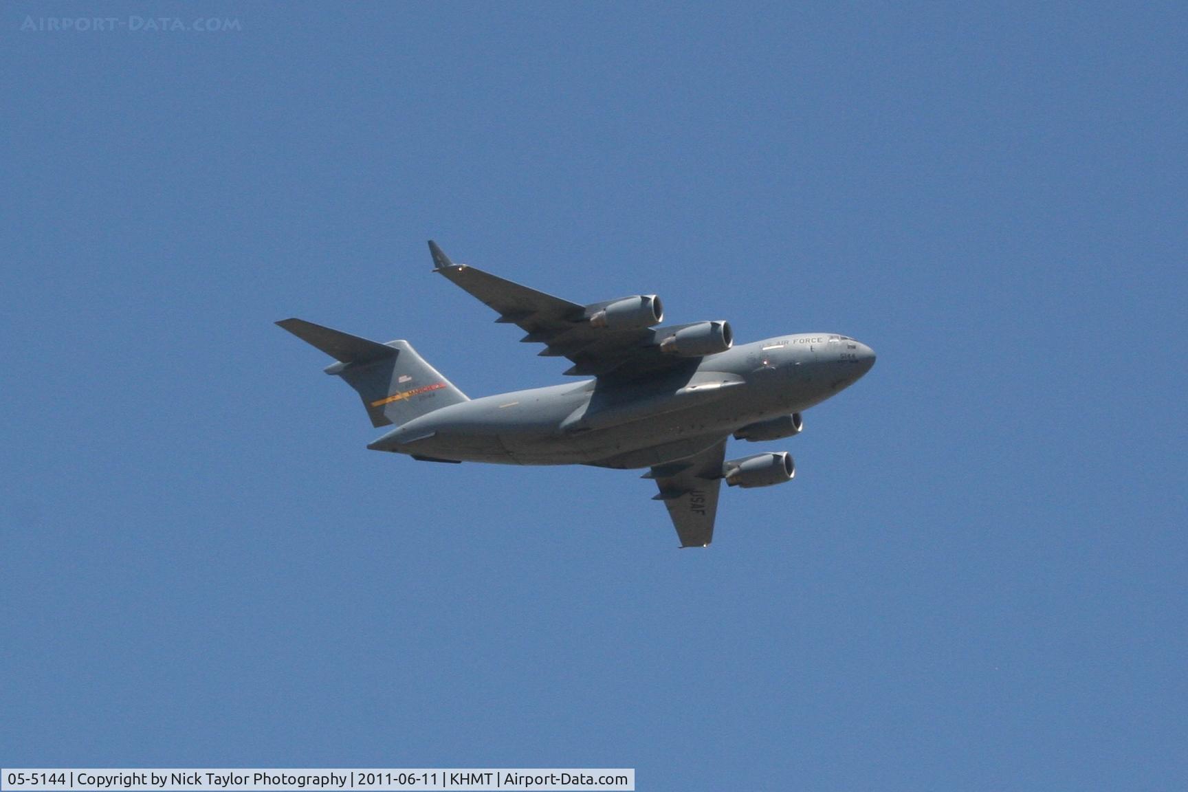 05-5144, 2005 Boeing C-17A Globemaster III C/N P-144, C-17 from March AFB passes through Hemet during the airshow
