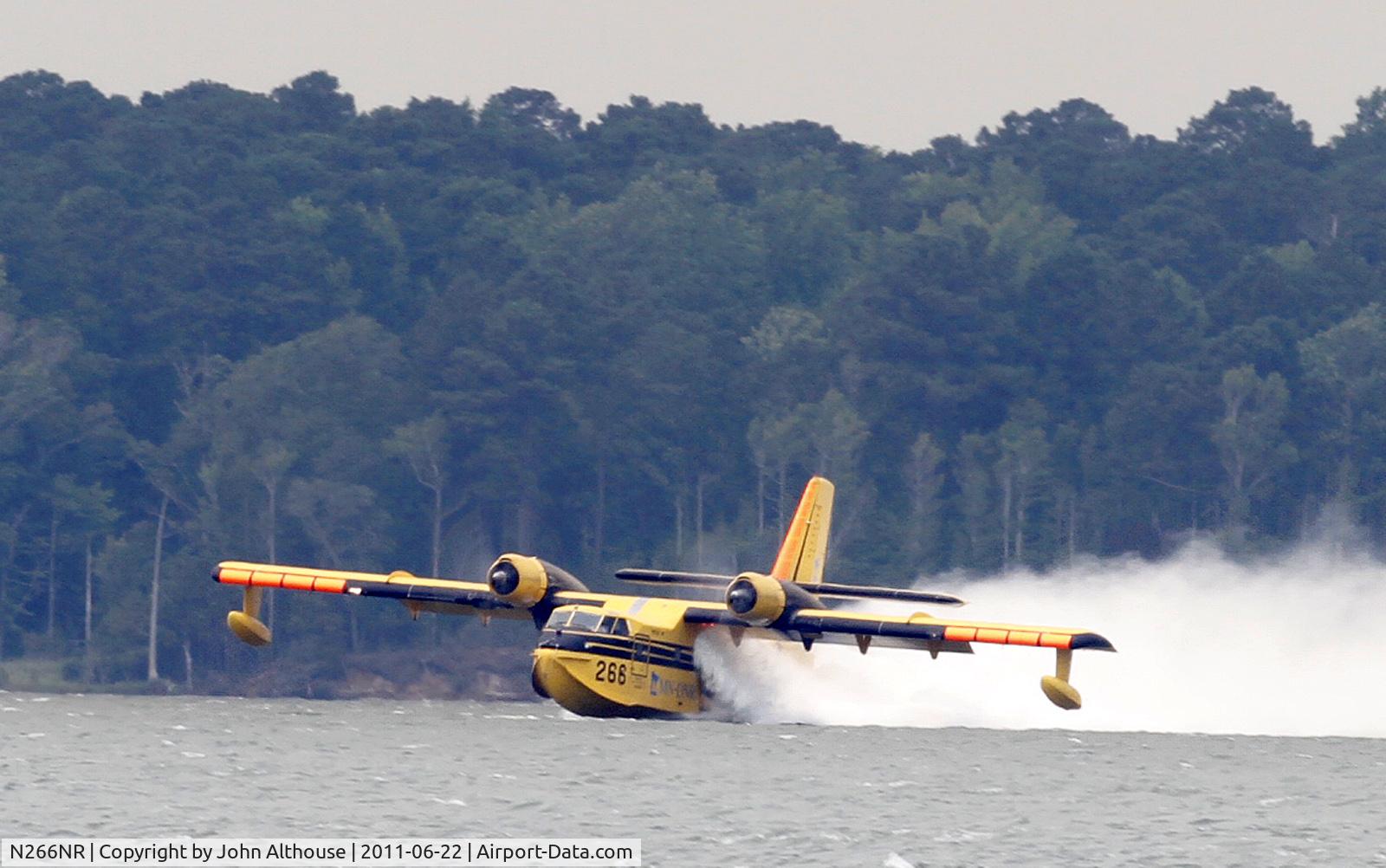 N266NR, 1987 Canadair CL-215-V (CL-215-1A10) C/N 1102, Filling up on New River, NC at SNeads Ferry area to assist at Holly Ridge Game Land fire