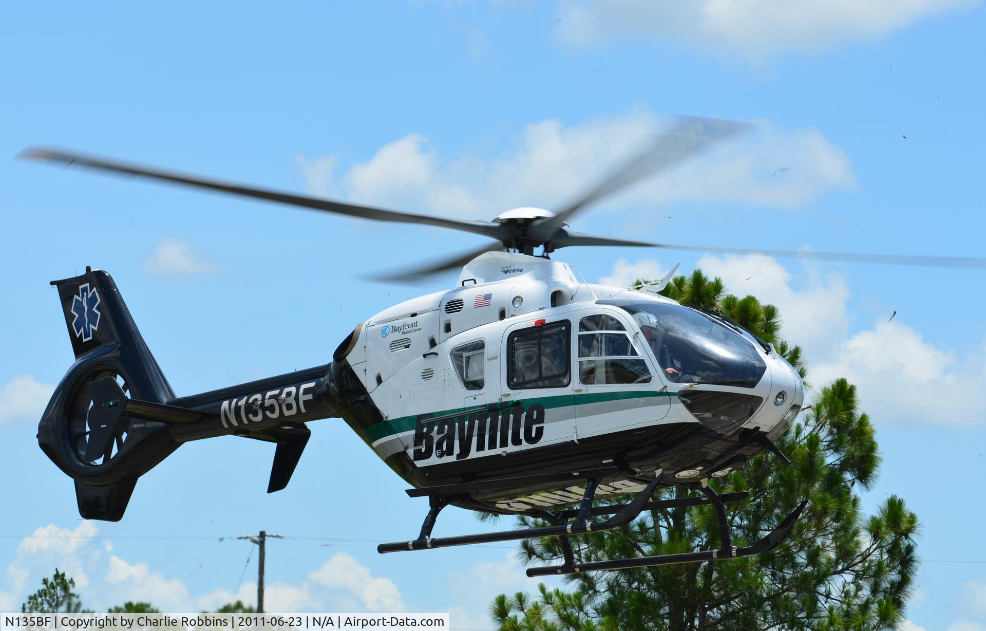 N135BF, 2006 Eurocopter EC-135P-2 C/N 0490, Bayflite 2 takes off from the l/z at East 14th Street & Joel Boulevard in Lehigh Acres, FL w/ a patient en route to Health Park Hospital.