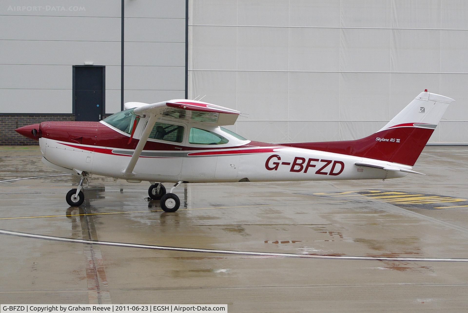 G-BFZD, 1978 Reims Cessna FR182 Skylane RG C/N 0010, Parked in the rain.