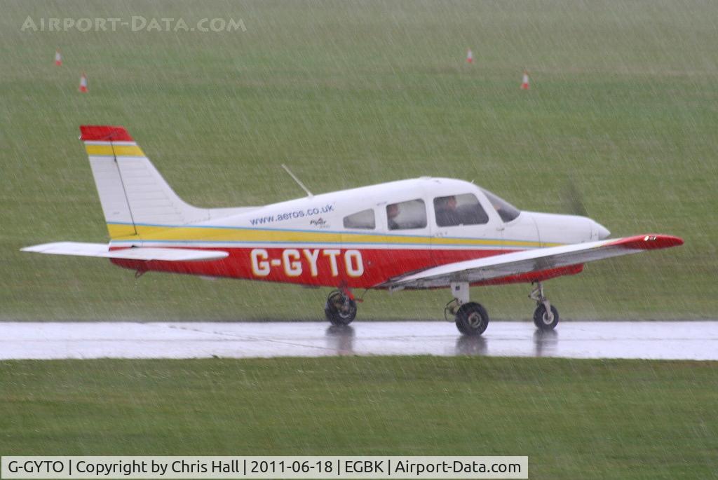 G-GYTO, 2000 Piper PA-28-161 Cherokee Warrior III C/N 2842082, at AeroExpo 2011