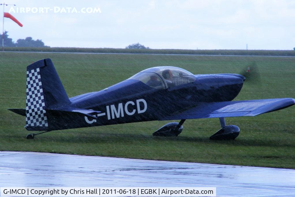 G-IMCD, 2005 Vans RV-7 C/N PFA 323-13965, arriving in the rain at AeroExpo 2011