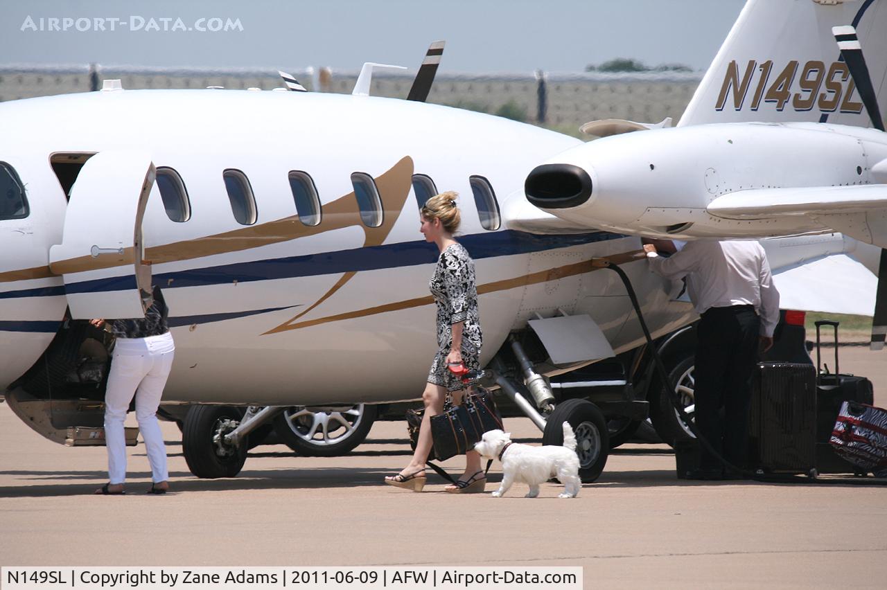 N149SL, 2003 Piaggio P-180 C/N 1077, Puppy dog gets an airplane ride! At Alliance Airport - Fort Worth, TX