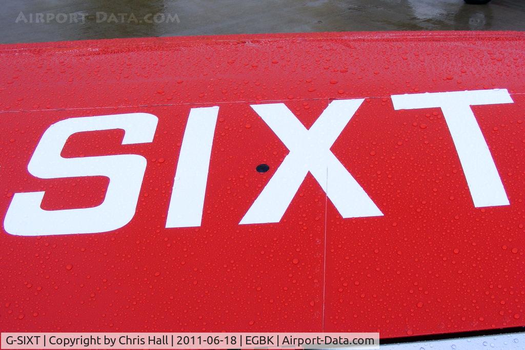 G-SIXT, 1988 Piper PA-28-161 Cherokee Warrior II C/N 2816056, Reg number on the top of the starboard wing of this retro PA-28