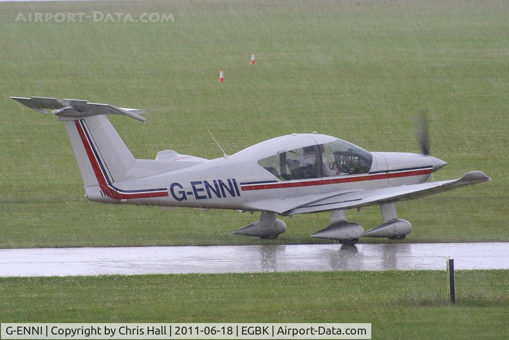 G-ENNI, 1987 Robin R-3000-180 C/N 128, arriving during one of the rain storms at at AeroExpo 2011