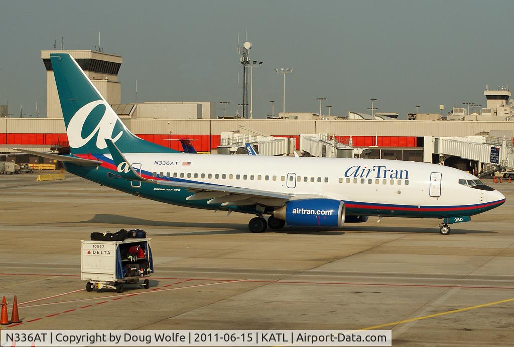 N336AT, 2008 Boeing 737-7BD C/N 36716, Advancing to the runway departing the gates in Atlanta.
