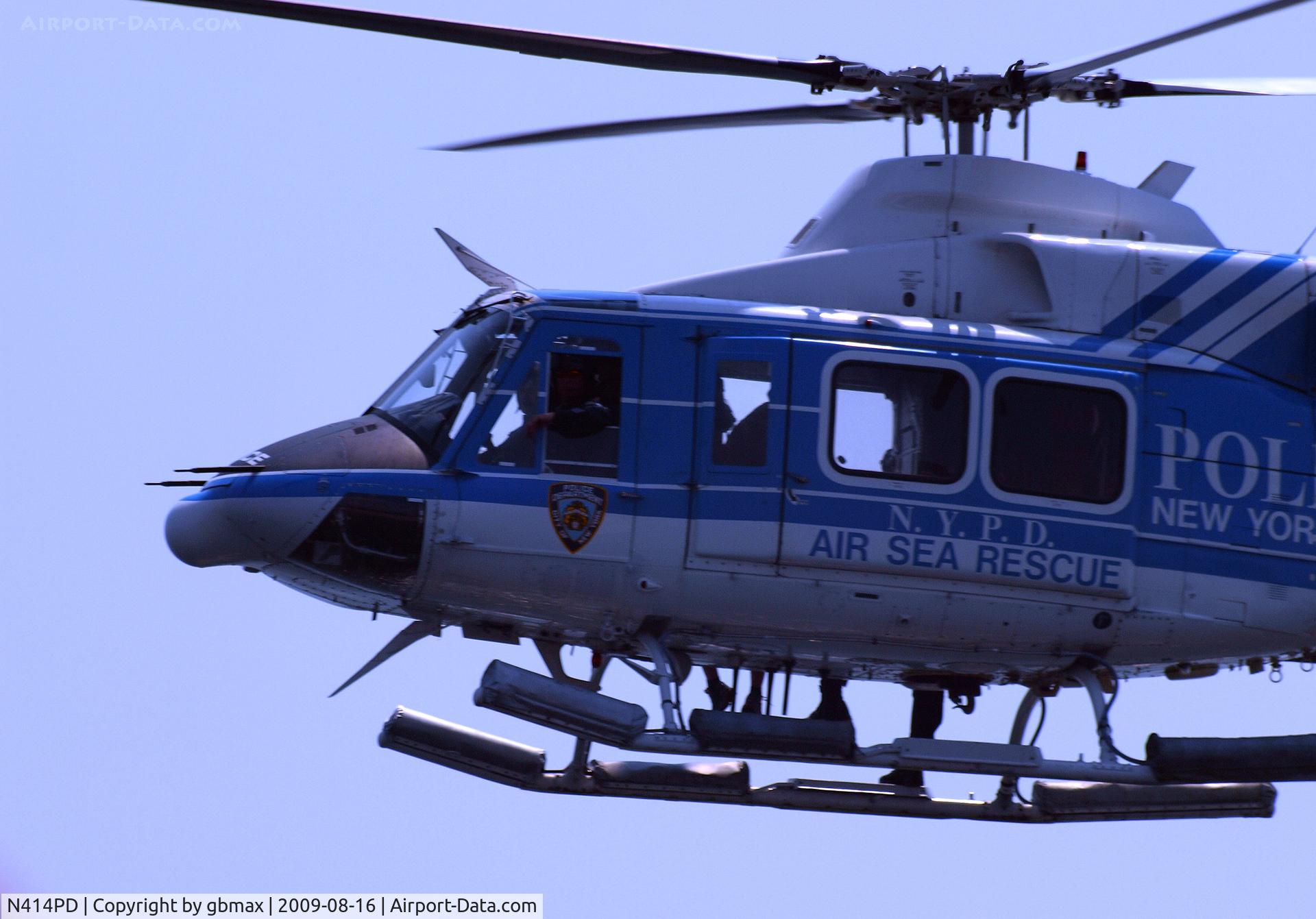 N414PD, 1999 Bell 412EP C/N 36233, Flying along beach @ Brighton Beach, Brooklyn,NY