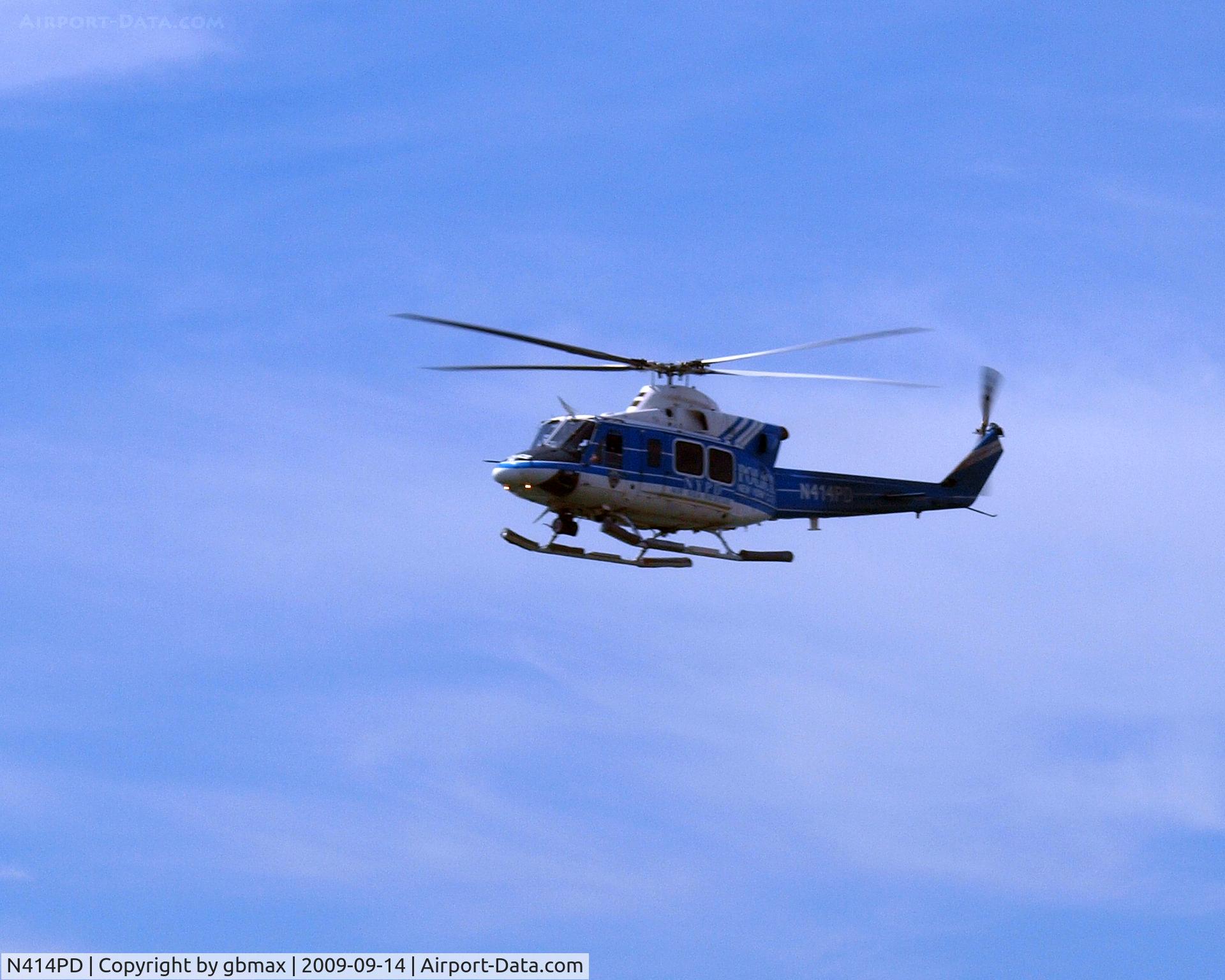 N414PD, 1999 Bell 412EP C/N 36233, Flying along beach @ Brighton Beach, Brooklyn,NY