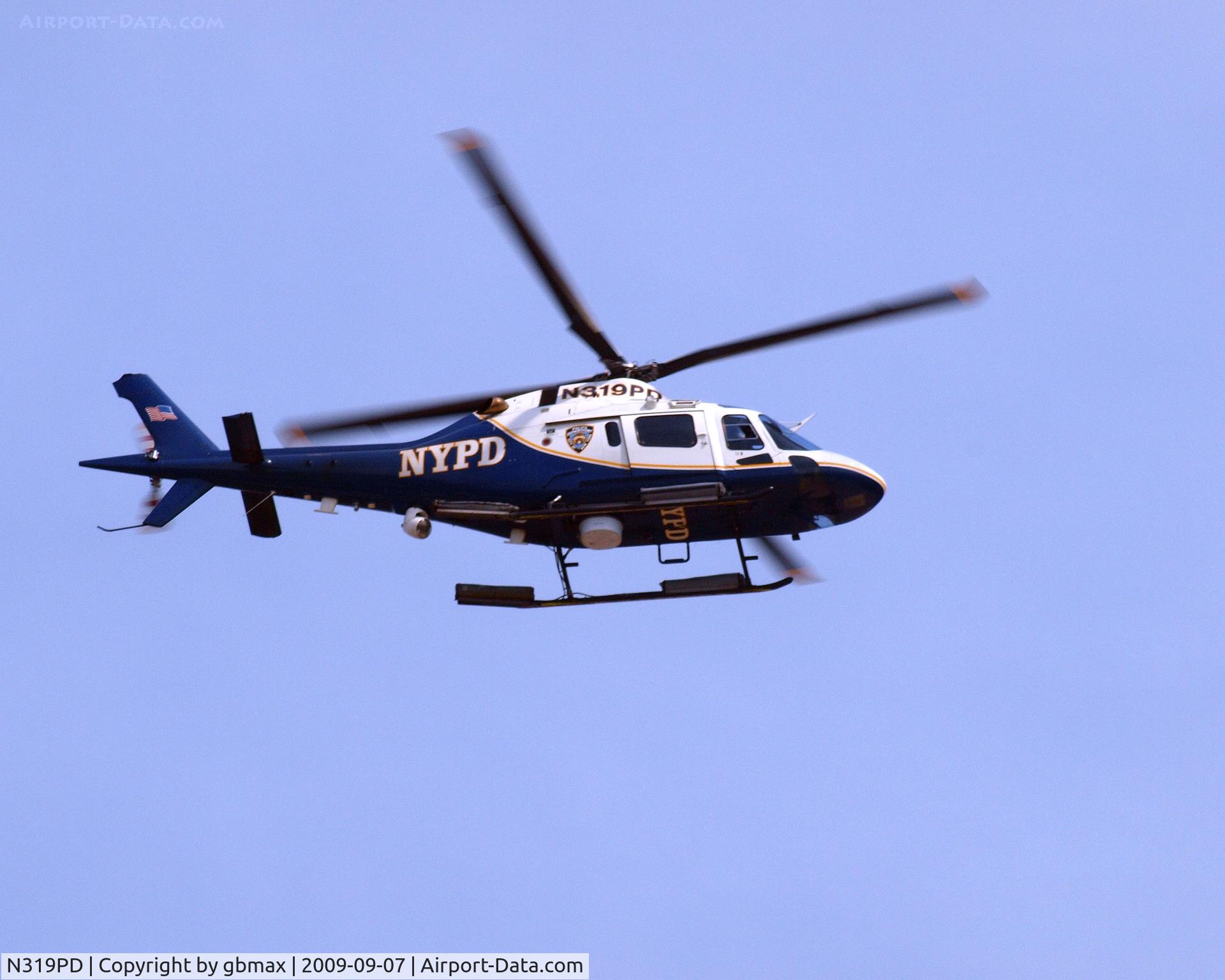 N319PD, 2004 Agusta A-119 Koala C/N 14040, Flying along beach @ Brighton Beach, Brooklyn,NY