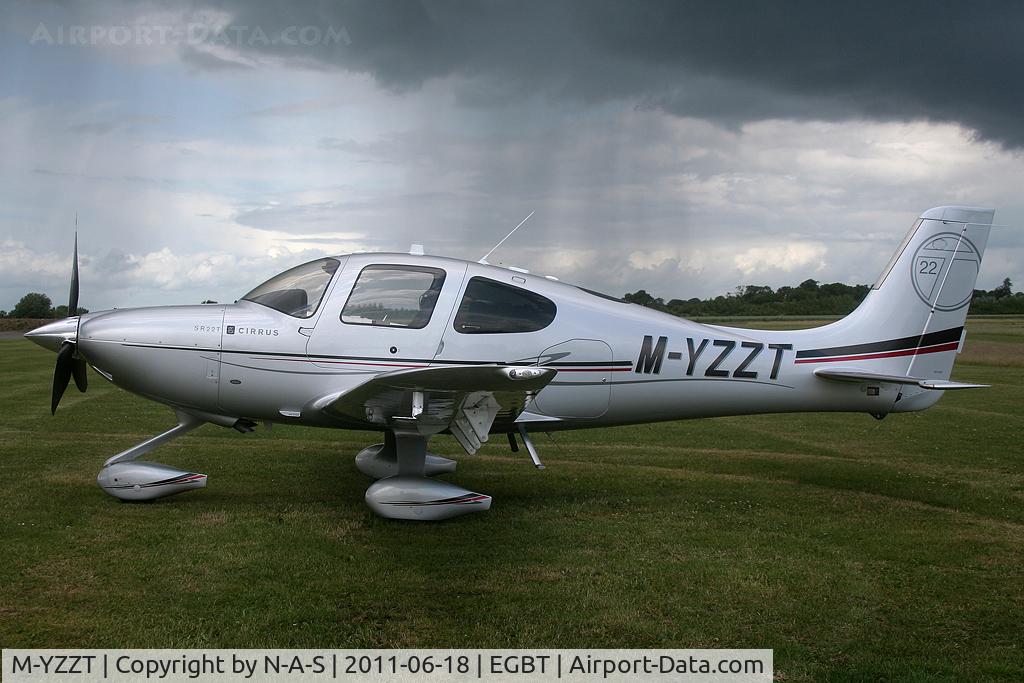 M-YZZT, 2011 Cirrus SR22T C/N 0073, With a passing shower behind