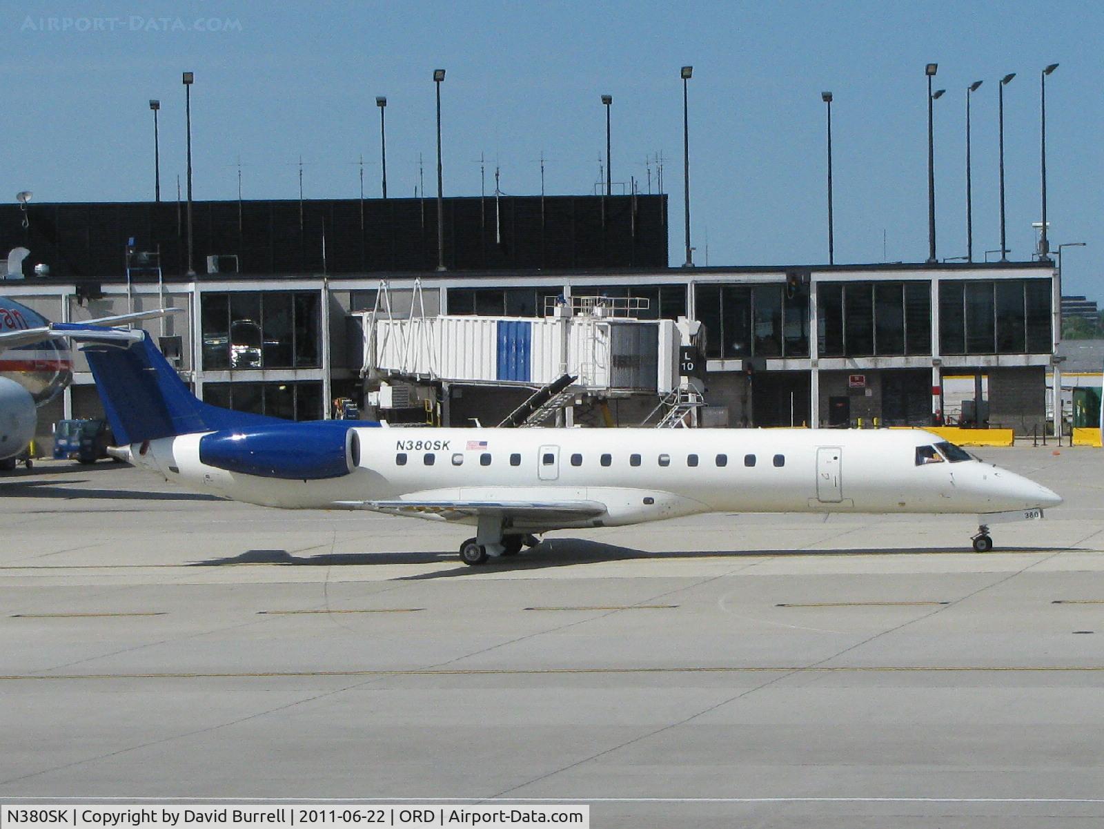 N380SK, 2002 Embraer ERJ-140LR (EMB-135KL) C/N 145613, Chautauqua Airlines Inc Embraer EMB-135KL taxiing at Chicago O'hare Airport.