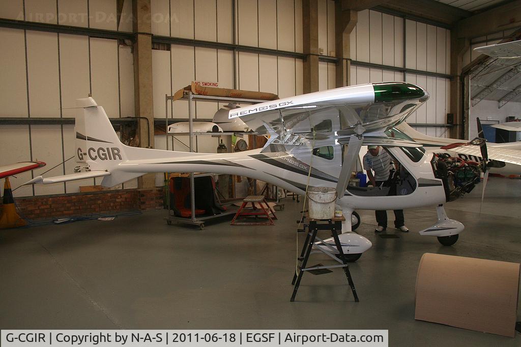 G-CGIR, 2010 Remos GX C/N 366, Tucked in a hangar