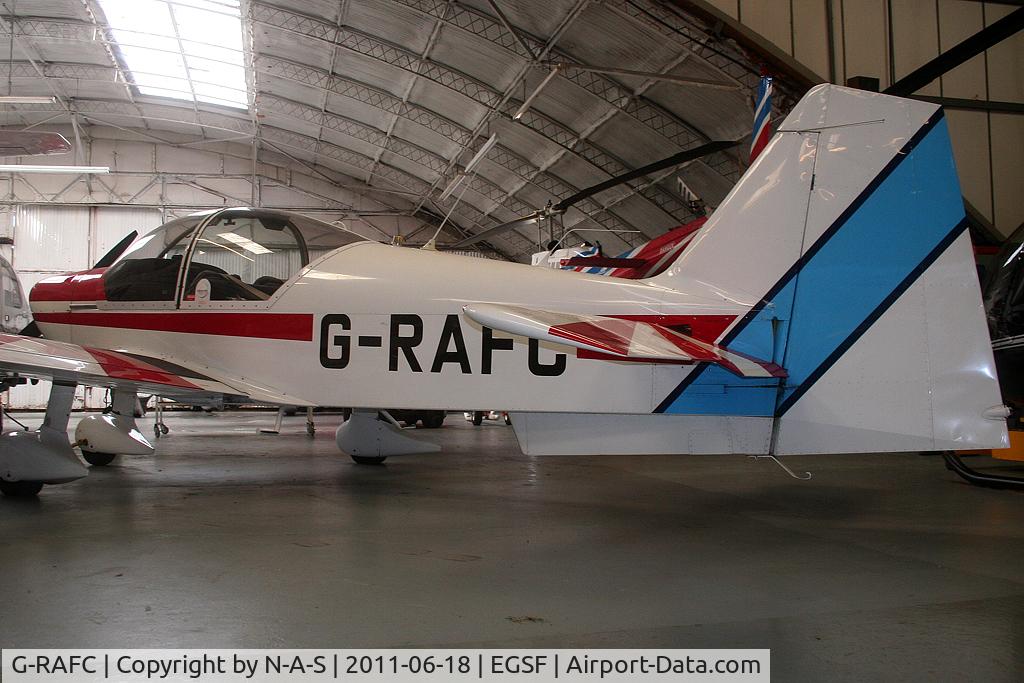 G-RAFC, 1980 Robin R-2112 Alpha C/N 192, Crammed in a hangar