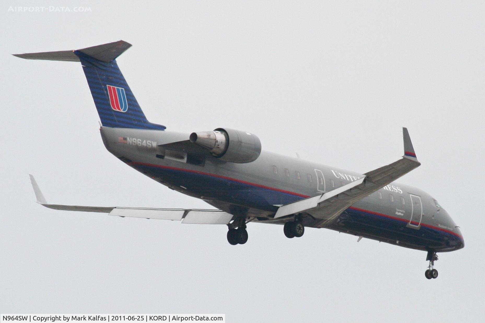 N964SW, 2003 Bombardier CRJ-200ER (CL-600-2B19) C/N 7868, SkyWest/United Express Bombardier CL-600-2B19, SKW5537 arriving from KSPI, RWY 10 approach KORD.