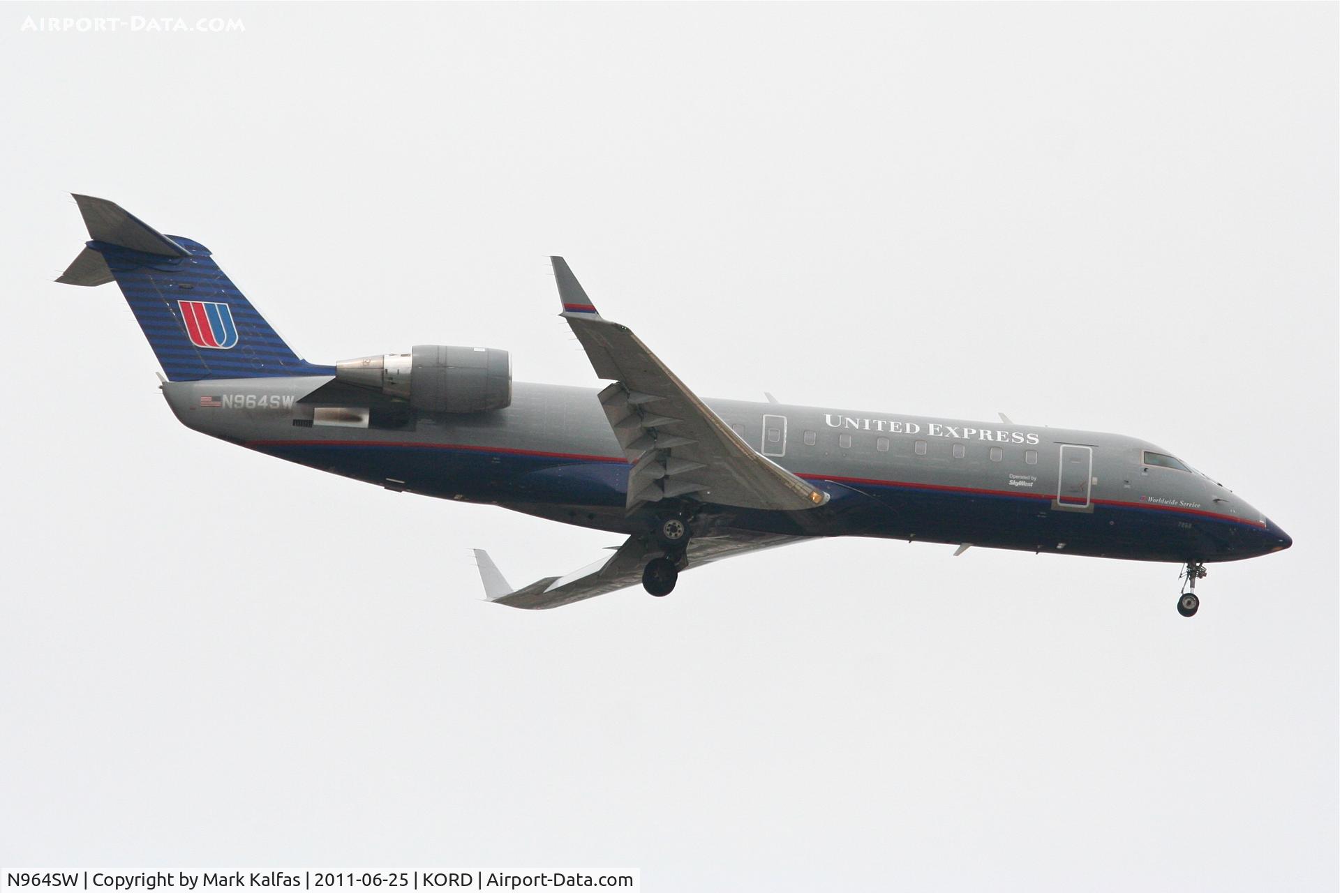 N964SW, 2003 Bombardier CRJ-200ER (CL-600-2B19) C/N 7868, SkyWest/United Express Bombardier CL-600-2B19, SKW5537 arriving from KSPI, RWY 10 approach KORD.