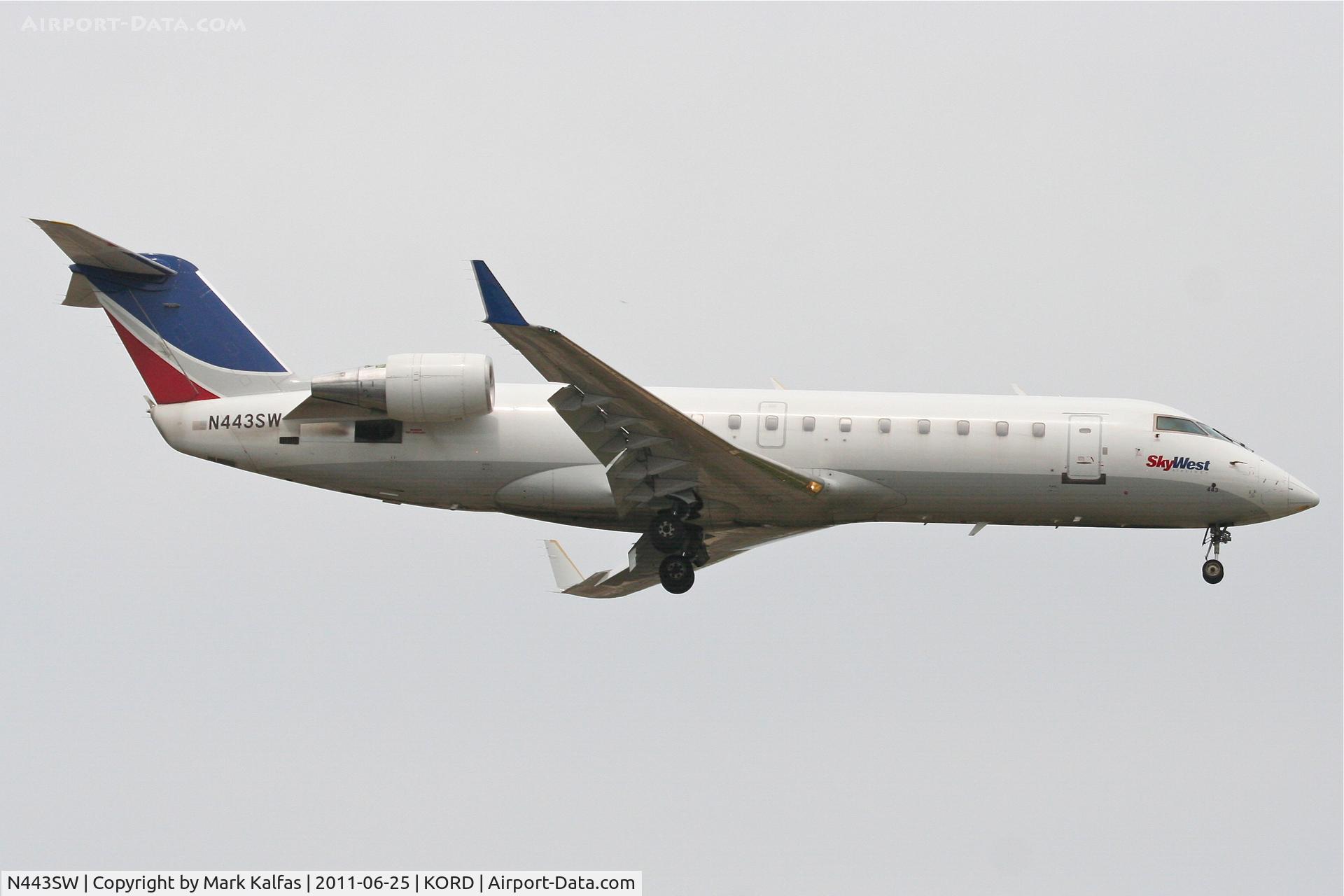 N443SW, 2002 Bombardier CRJ-200LR (CL-600-2B19) C/N 7638, SkyWest Bombardier CL-600-2B19, SKW6375, arriving from KCMX, RWY 14R approach KORD.