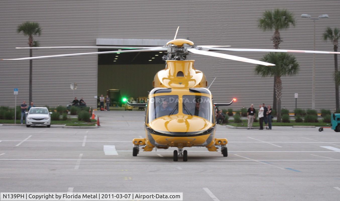 N139PH, 2008 AgustaWestland AW-139 C/N 31121, PHI AW 139 leaving Heliexpo Orlando