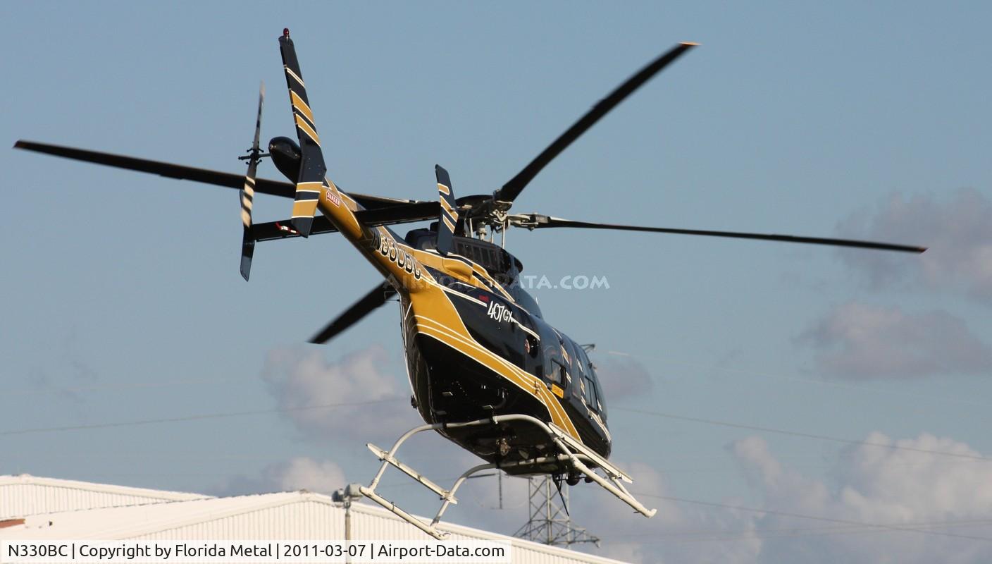 N330BC, 2006 Bell 407 C/N 53717, Bell 407 leaving Heliexpo Orlando