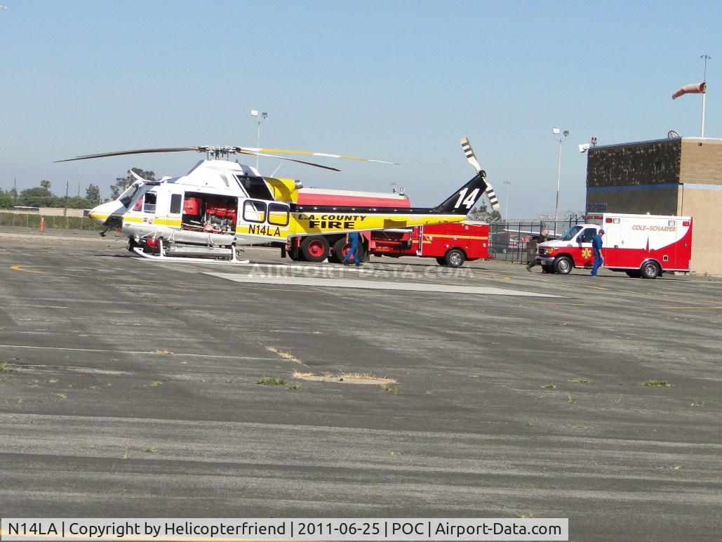 N14LA, 2005 Bell 412EP C/N 36393, Waiting for ambulance to transfer victim for flight