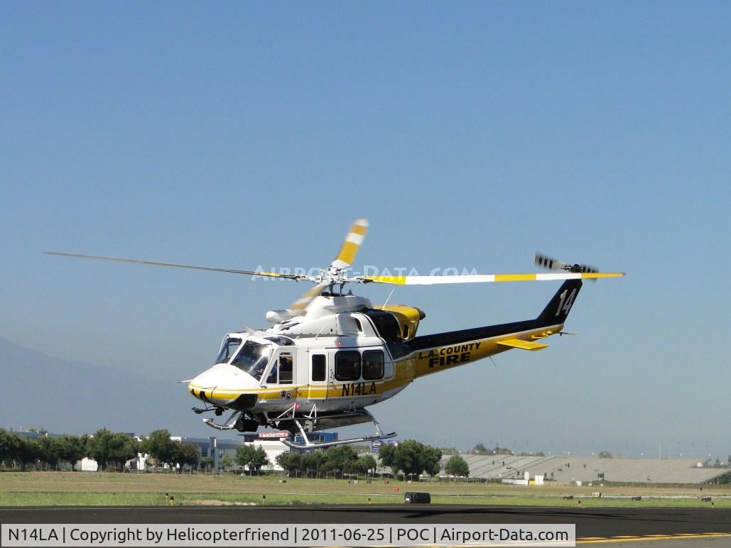 N14LA, 2005 Bell 412EP C/N 36393, Victim and crew onboard and heading out westbound from taxiway Sierra