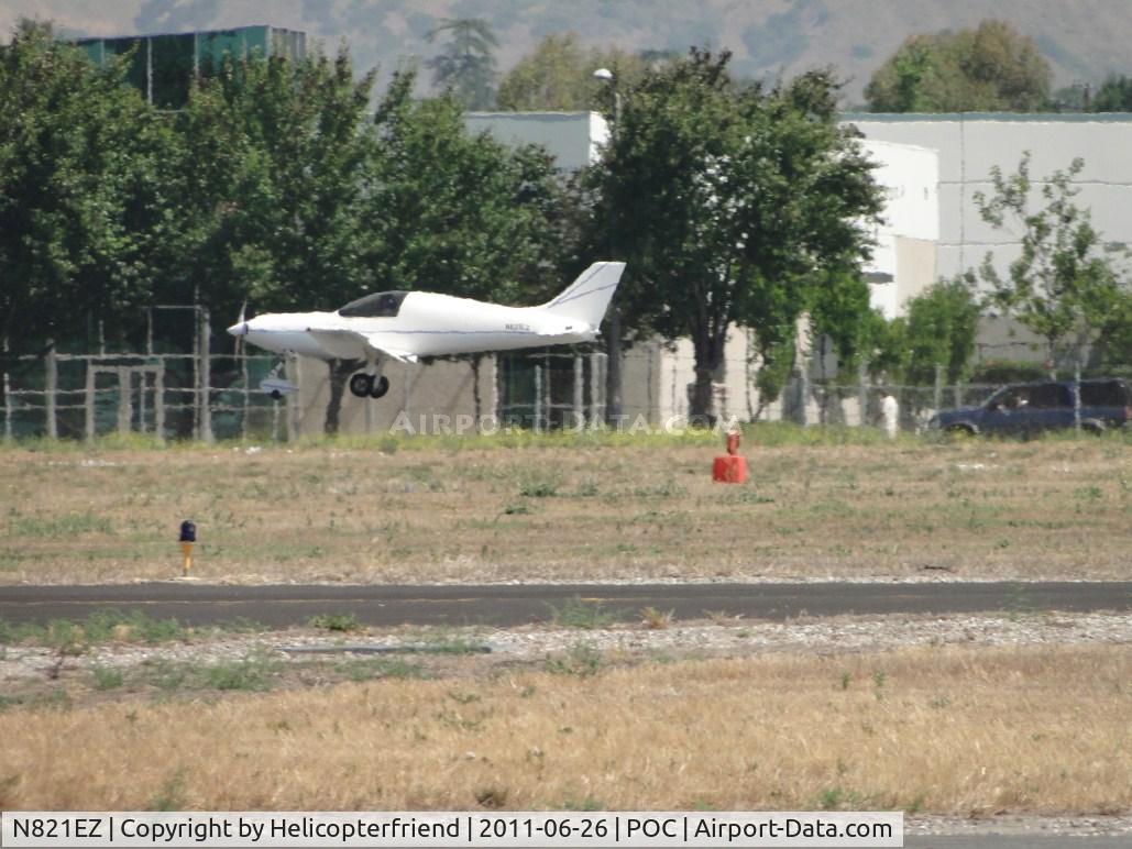 N821EZ, 2006 Aero Designs Pulsar 582 C/N 221, Making a low pass westbound on runway 26R
