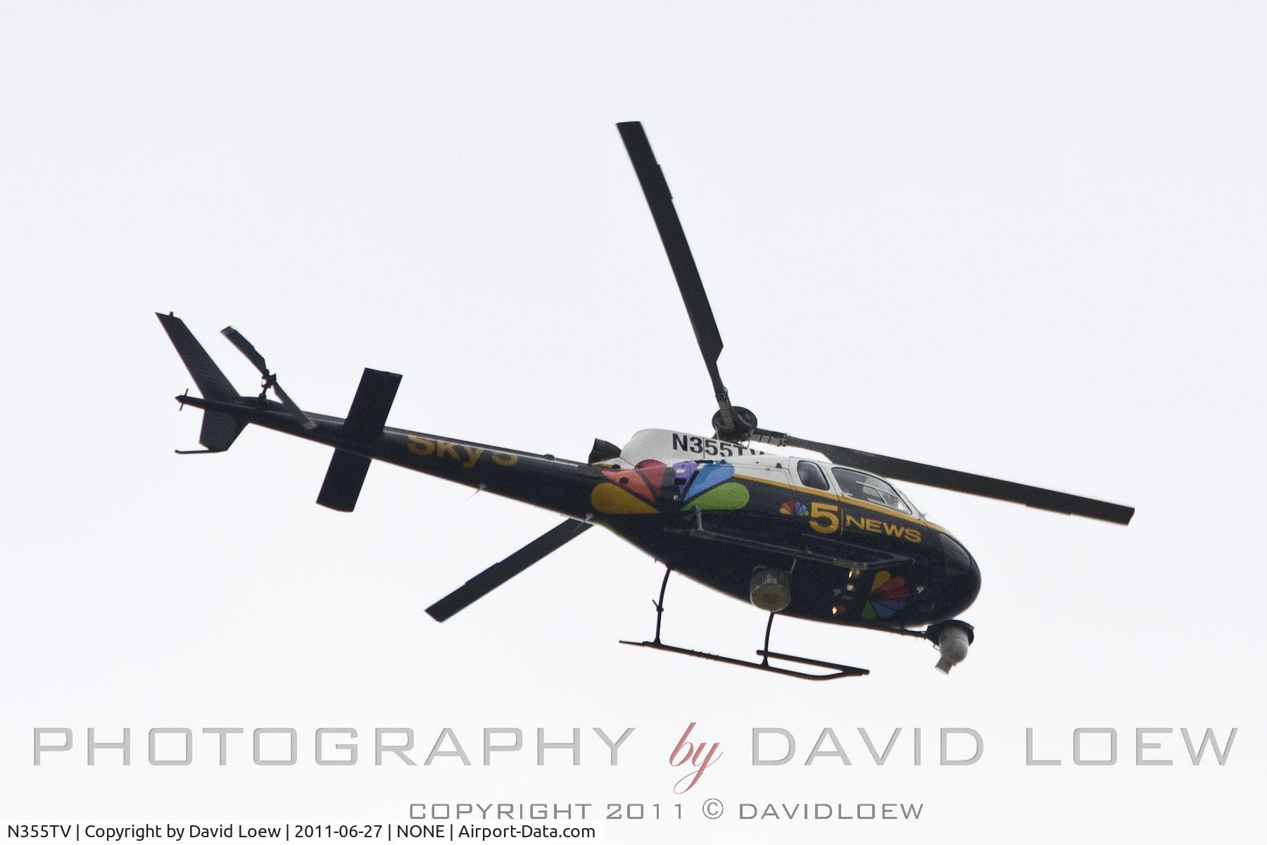 N355TV, 1992 Eurocopter AS-350BA Ecureuil C/N 2647, Hovering over Cullum and Motzart in Chicago
