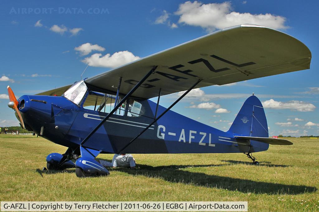 G-AFZL, 1939 Porterfield CP-50 Collegiate C/N 581, 1939 Porterfield Airplane Co PORTERFIELD CP50, c/n: 581 at Leicester - had been at Baxterley earlier in the day - pilots resting under the shade of the wing