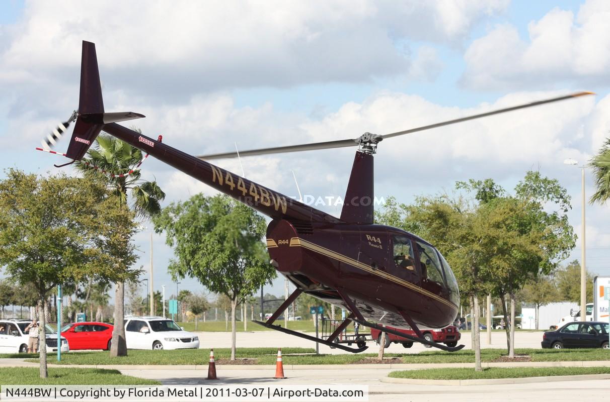 N444BW, 2006 Robinson R44 II C/N 11254, R44 leaving Heliexpo Orlando