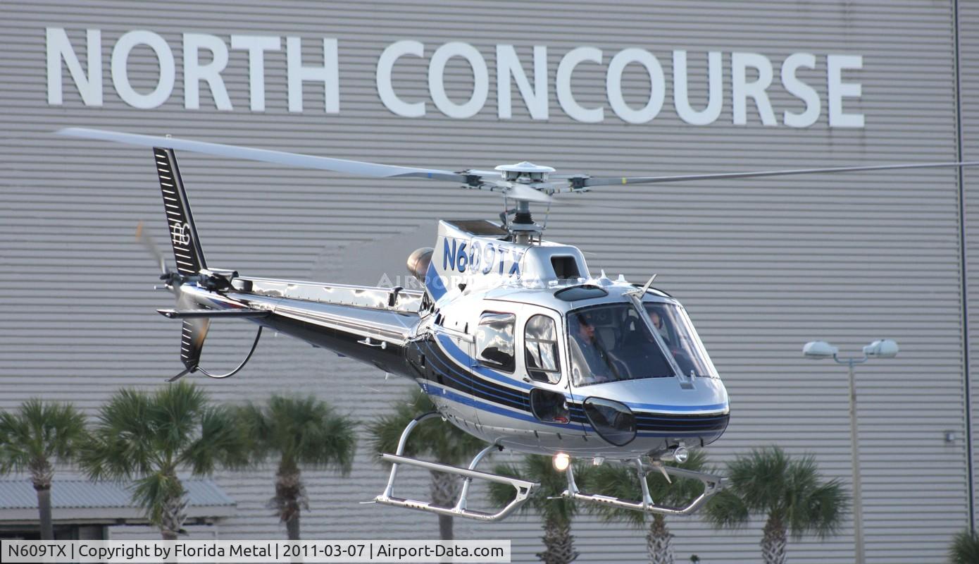 N609TX, Eurocopter AS-350B-2 Ecureuil Ecureuil C/N 4776, AS 350 leaving heliexpo