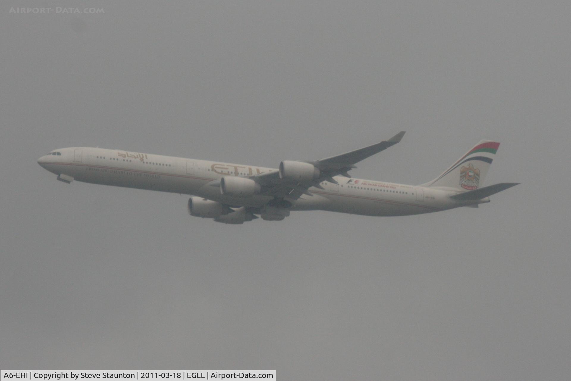 A6-EHI, 2008 Airbus A340-642X C/N 929, Taken at London Heathrow on a cold wet March 2011 afternoon - waiting our early flight to USA for aviation storage yard tour