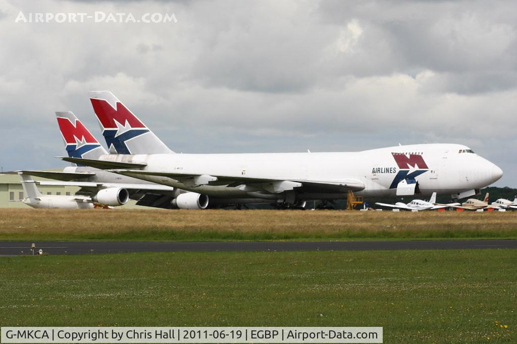 G-MKCA, 1980 Boeing 747-2B5B/SF C/N 22482, with G-MKGA both still in storage at Kemble