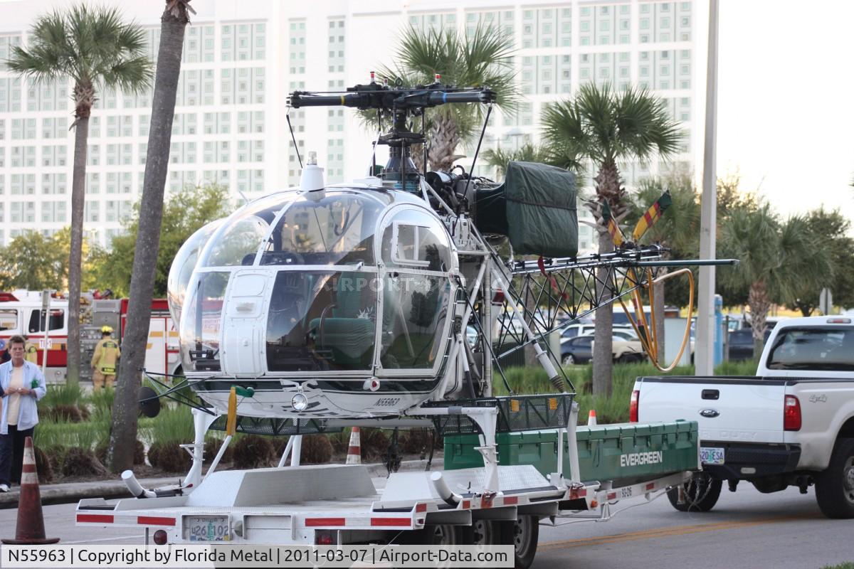 N55963, 1975 Aérospatiale SA-315B Lama C/N 2428, Evergreen SA315B leaving Heliexpo Orlando on a trailer